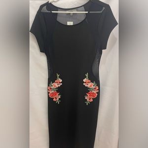 Black dress with embroidered flowers